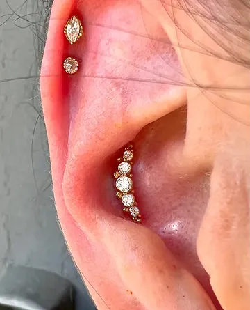 ear piercing closeup